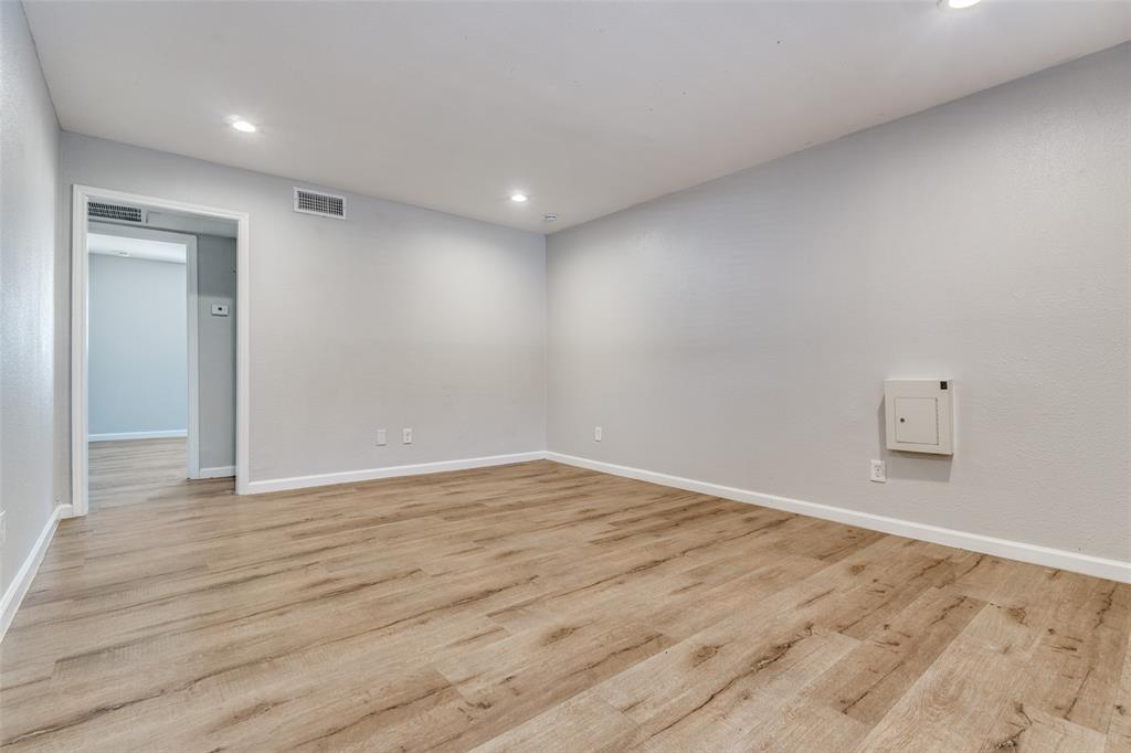 4618 Reiger Avenue, Unit 101 Dallas, TX 75246 - Photo 11 of 17 a view of an empty room