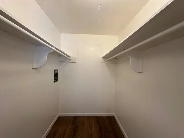 a view of a room with racks on the wall