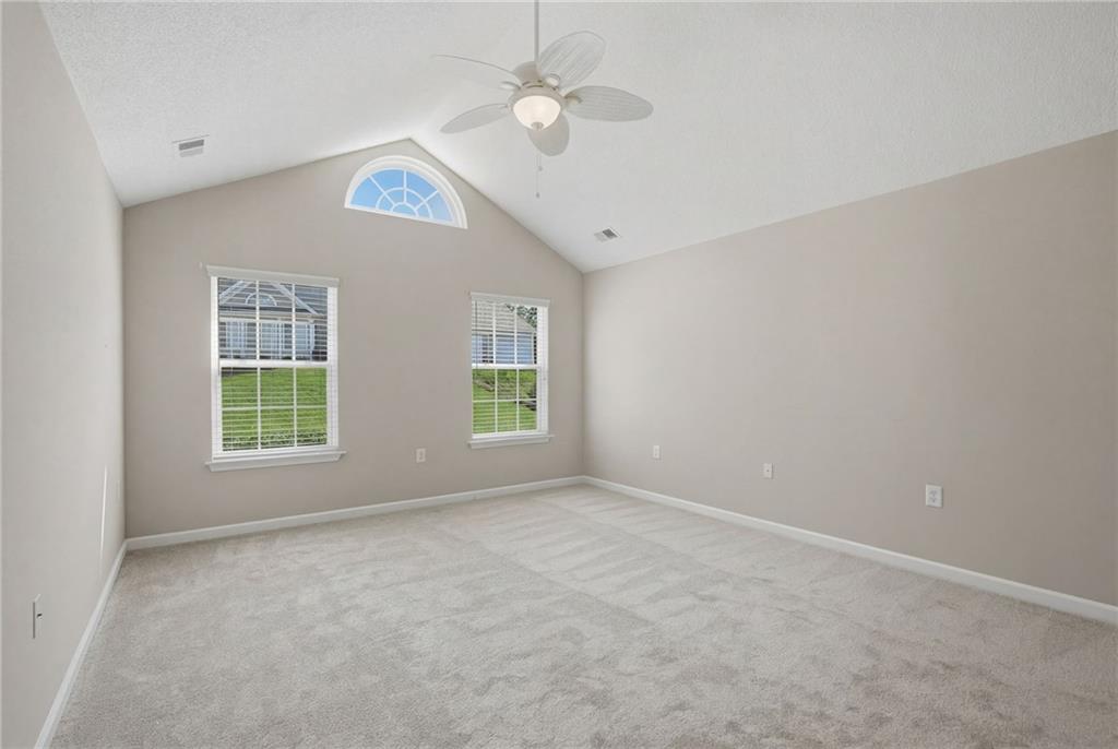 2994 Oakside Circle Alpharetta, GA 30004 - Photo 20 of 32 an empty room with windows and fan