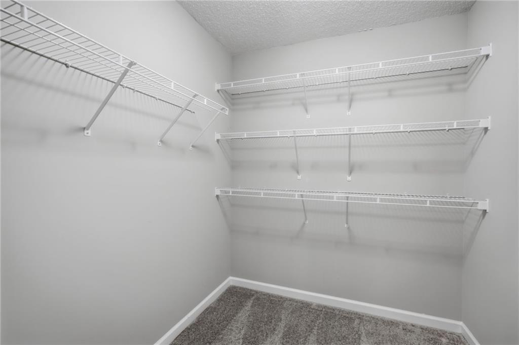 2994 Oakside Circle Alpharetta, GA 30004 - Photo 24 of 32 a view of a room with racks on the wall