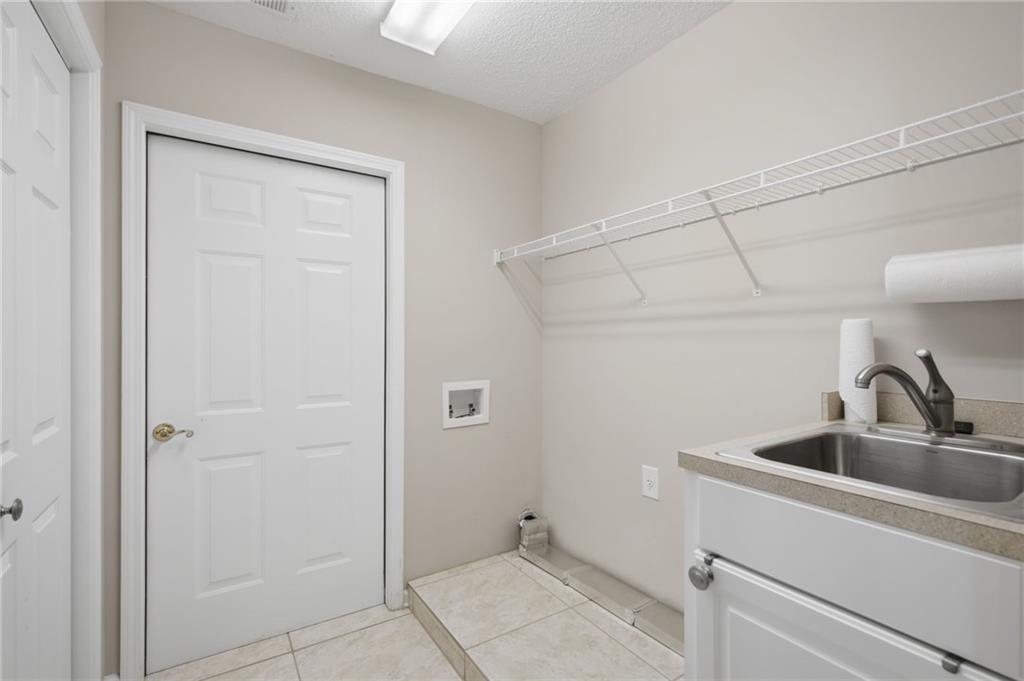 2994 Oakside Circle Alpharetta, GA 30004 - Photo 28 of 32 a close view of a sink and tap