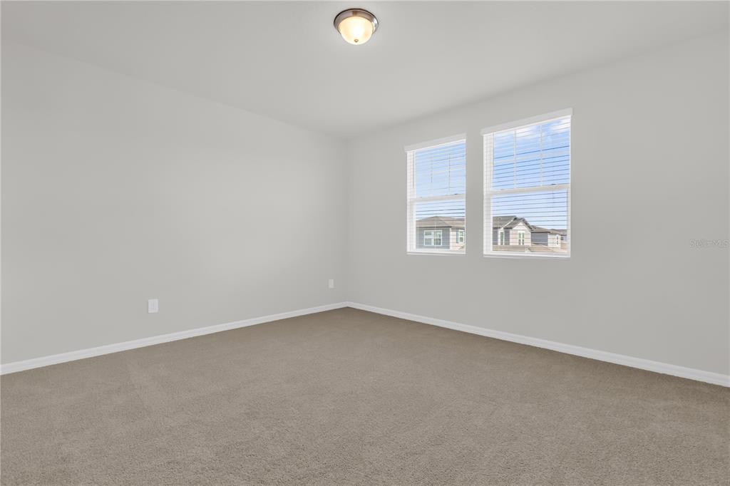 4556 Homestead Trail St. Cloud, FL 34772 - Photo 11 of 31 an empty room with a window