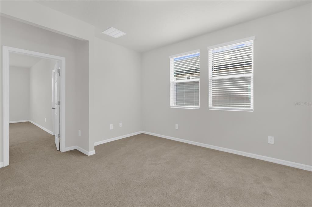 4556 Homestead Trail St. Cloud, FL 34772 - Photo 14 of 31 a view of an empty room with a window