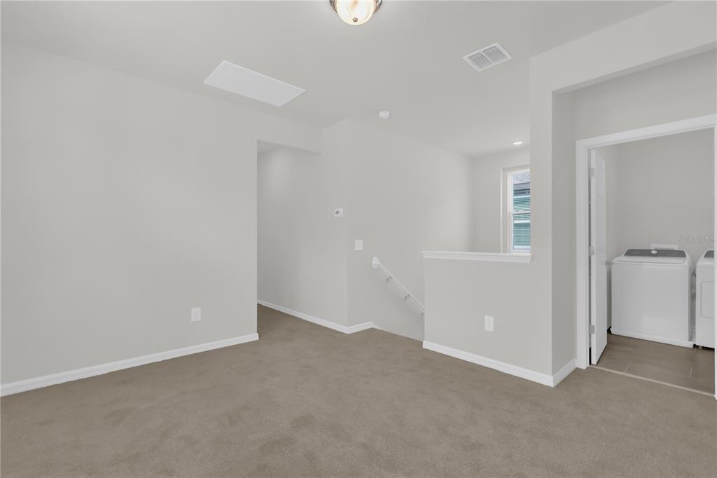 4556 Homestead Trail St. Cloud, FL 34772 - Photo 15 of 31 a view of an empty room with a window