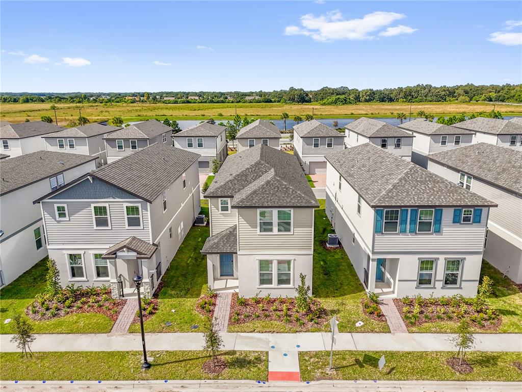 4556 Homestead Trail St. Cloud, FL 34772 - Photo 28 of 31 a front view of a house with a ocean view