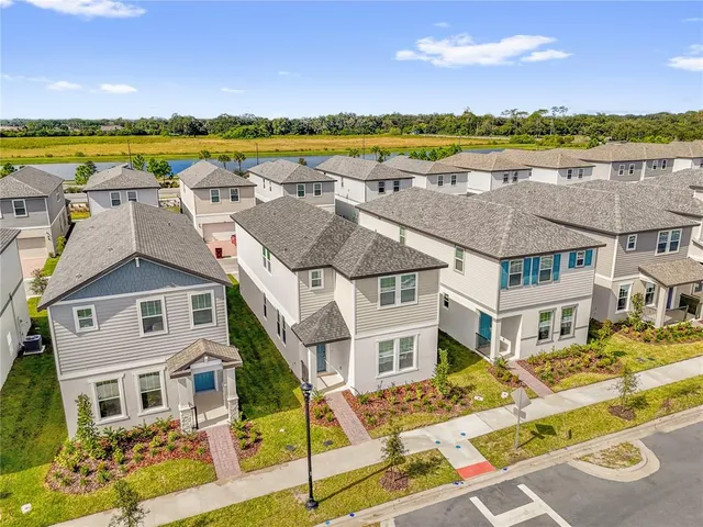 a view of a house with a ocean view