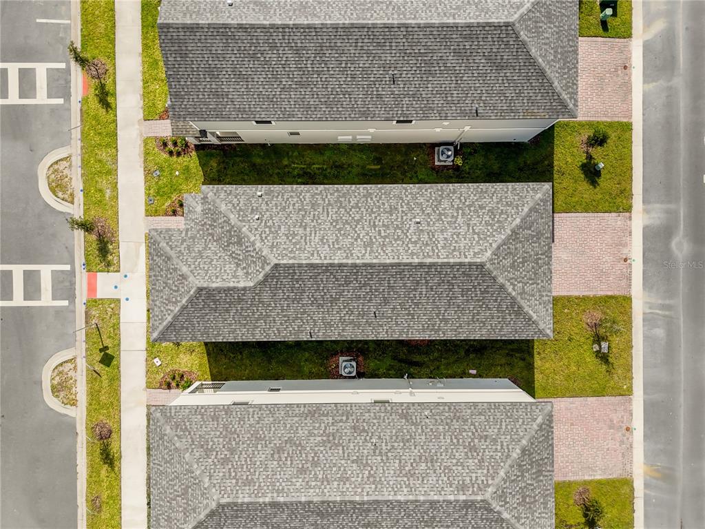 4556 Homestead Trail St. Cloud, FL 34772 - Photo 30 of 31 front view of a house with a wall