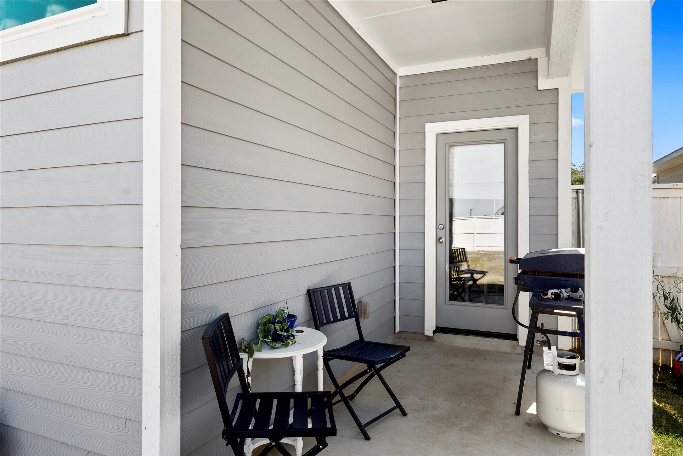 156 Appleberry Lane Elgin, TX 78621 - Photo 25 of 40 View of patio with room for a small grill