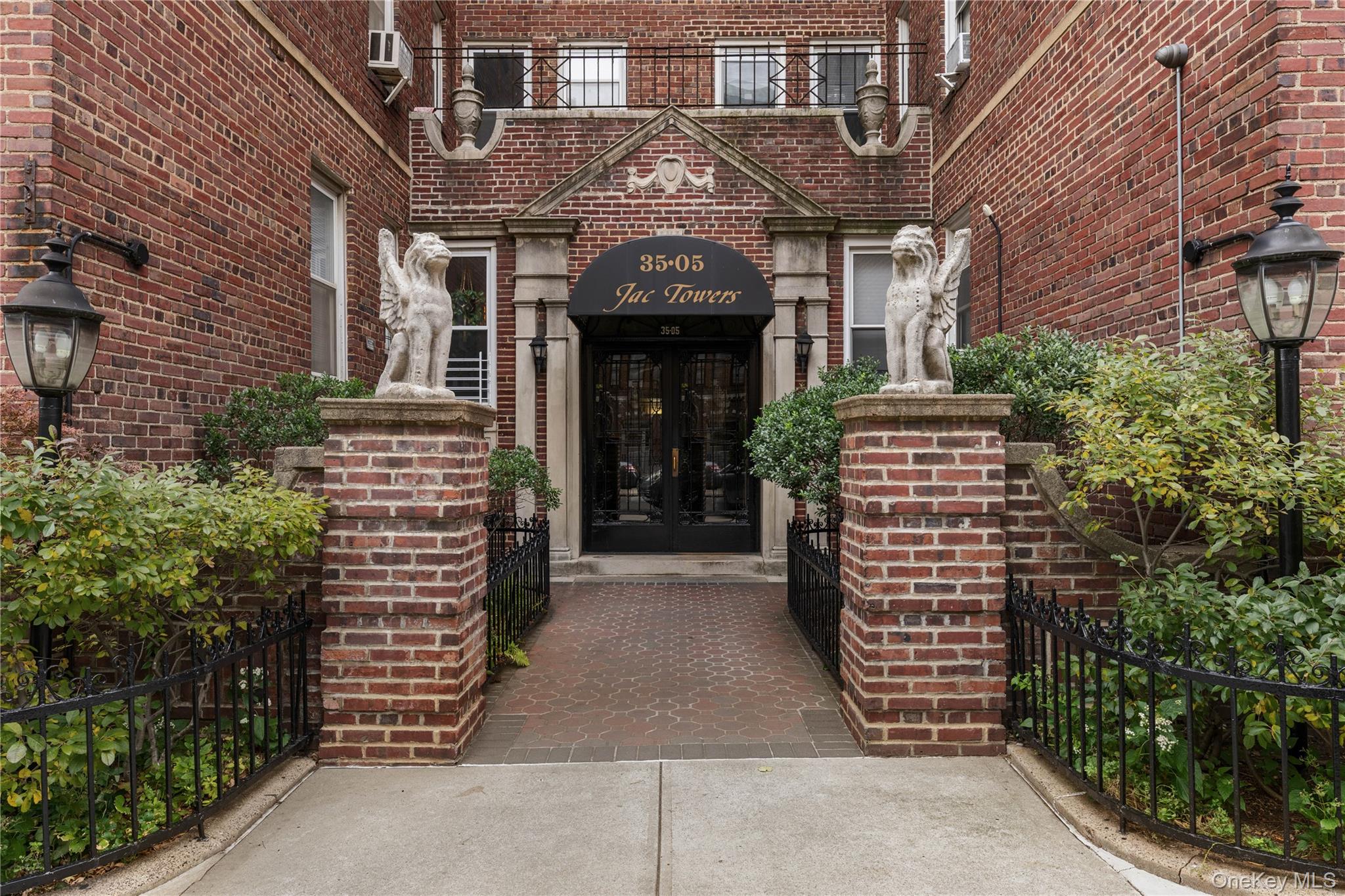 35-05 72nd Street, Unit 2E Queens, NY 11372 - Photo 12 of 14 front view of a brick building