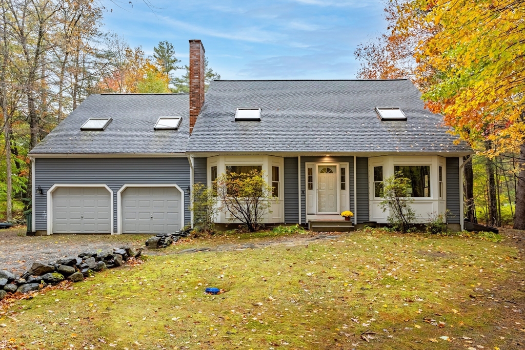 93 Turner Road Townsend, MA 01469 - Photo 1 of 32 a front view of a house with a yard