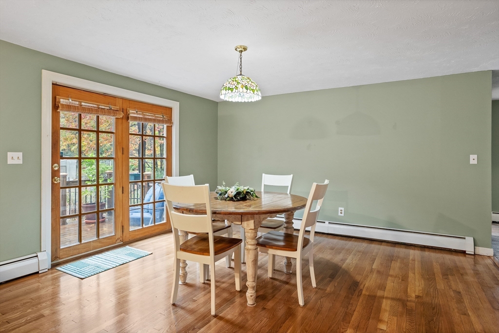 93 Turner Road Townsend, MA 01469 - Photo 14 of 32 a view of a dining room with furniture window and wooden floor
