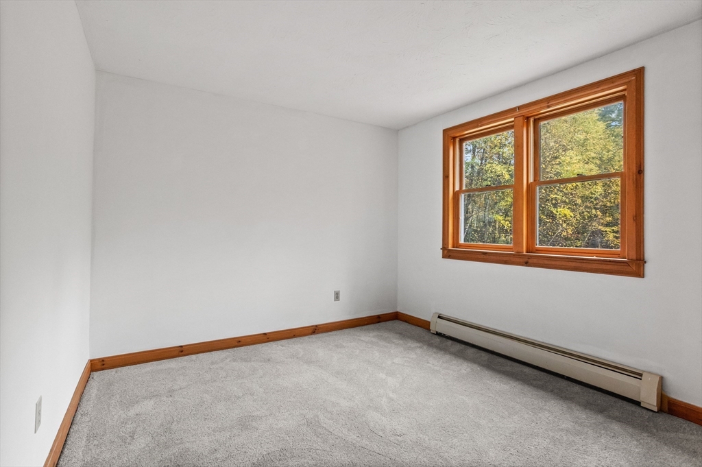 93 Turner Road Townsend, MA 01469 - Photo 17 of 32 an empty room with a window