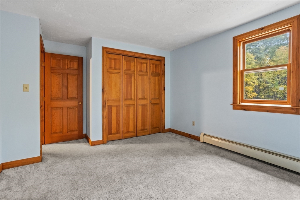 93 Turner Road Townsend, MA 01469 - Photo 18 of 32 an empty room with windows