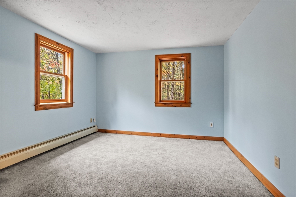 93 Turner Road Townsend, MA 01469 - Photo 19 of 32 an empty room with windows