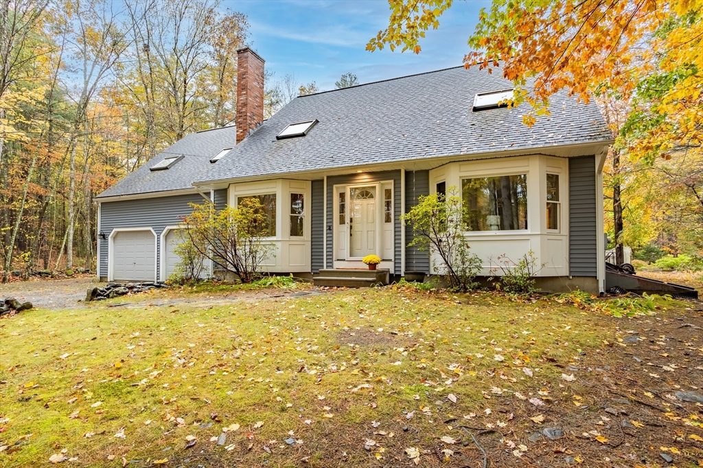 93 Turner Road Townsend, MA 01469 - Photo 2 of 32 front view of a house with a yard