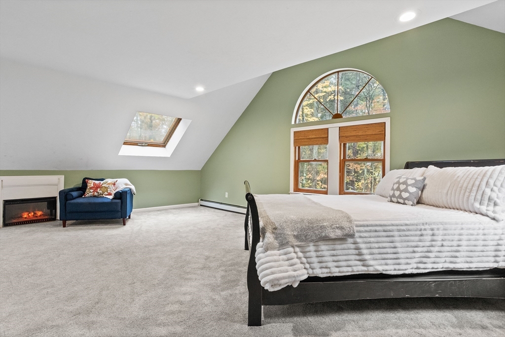 93 Turner Road Townsend, MA 01469 - Photo 22 of 32 a bedroom with a bed and a window