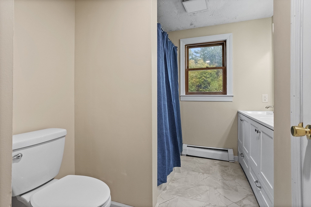 93 Turner Road Townsend, MA 01469 - Photo 27 of 32 a bathroom with a toilet