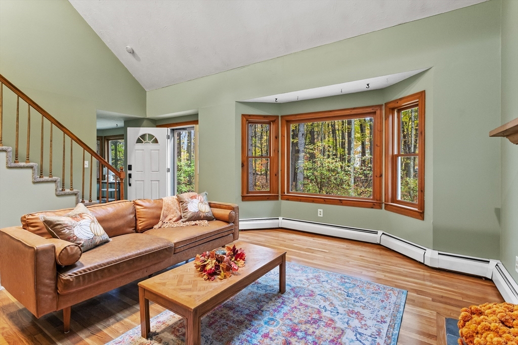 93 Turner Road Townsend, MA 01469 - Photo 4 of 32 a living room with furniture and a large window