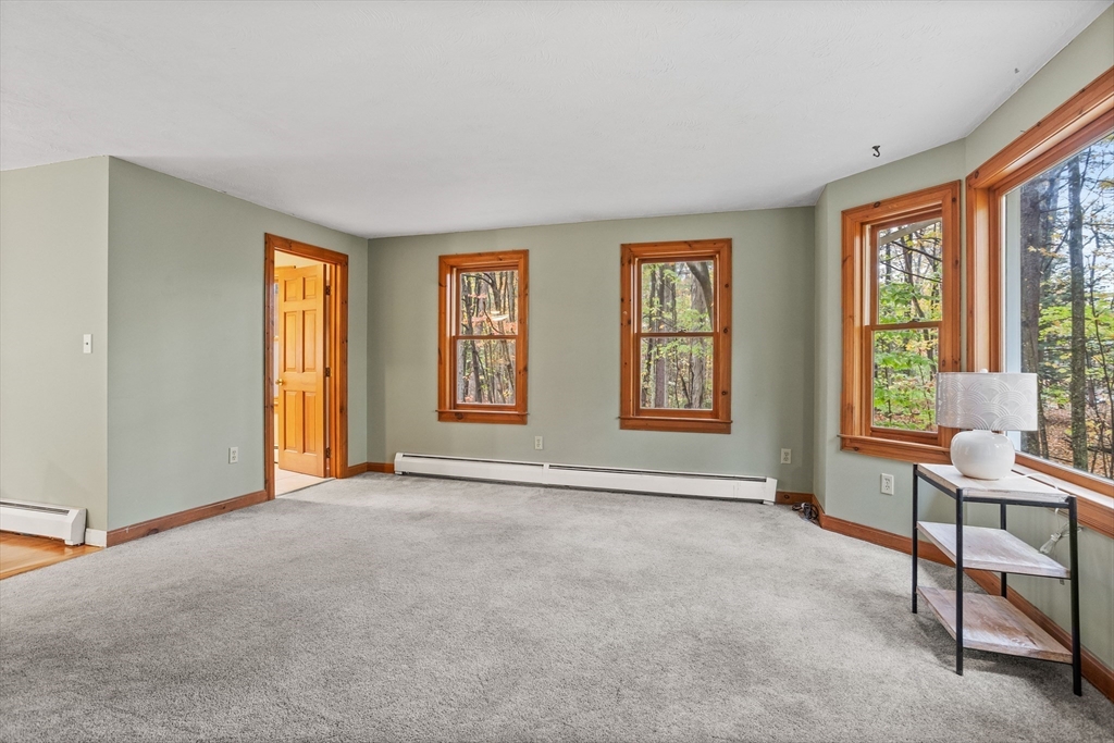 93 Turner Road Townsend, MA 01469 - Photo 7 of 32 a view of an empty room with a window