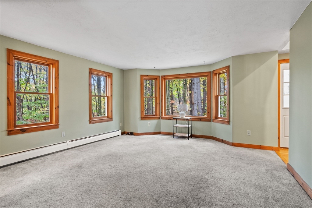 93 Turner Road Townsend, MA 01469 - Photo 8 of 32 a view of an empty room with a window