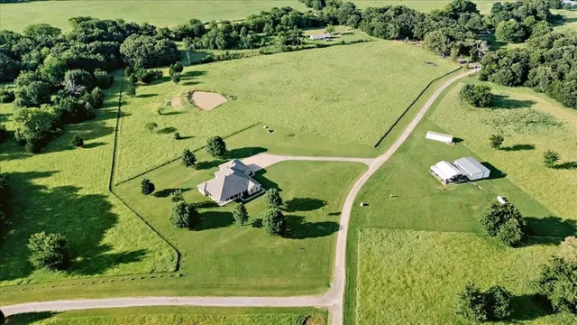 an aerial view of a pool