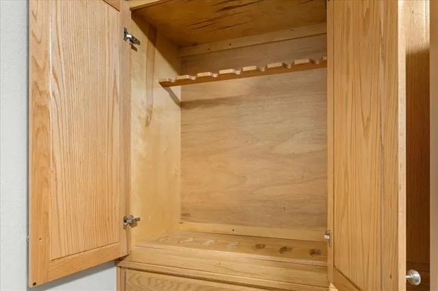a bathroom with a shower and a glass door