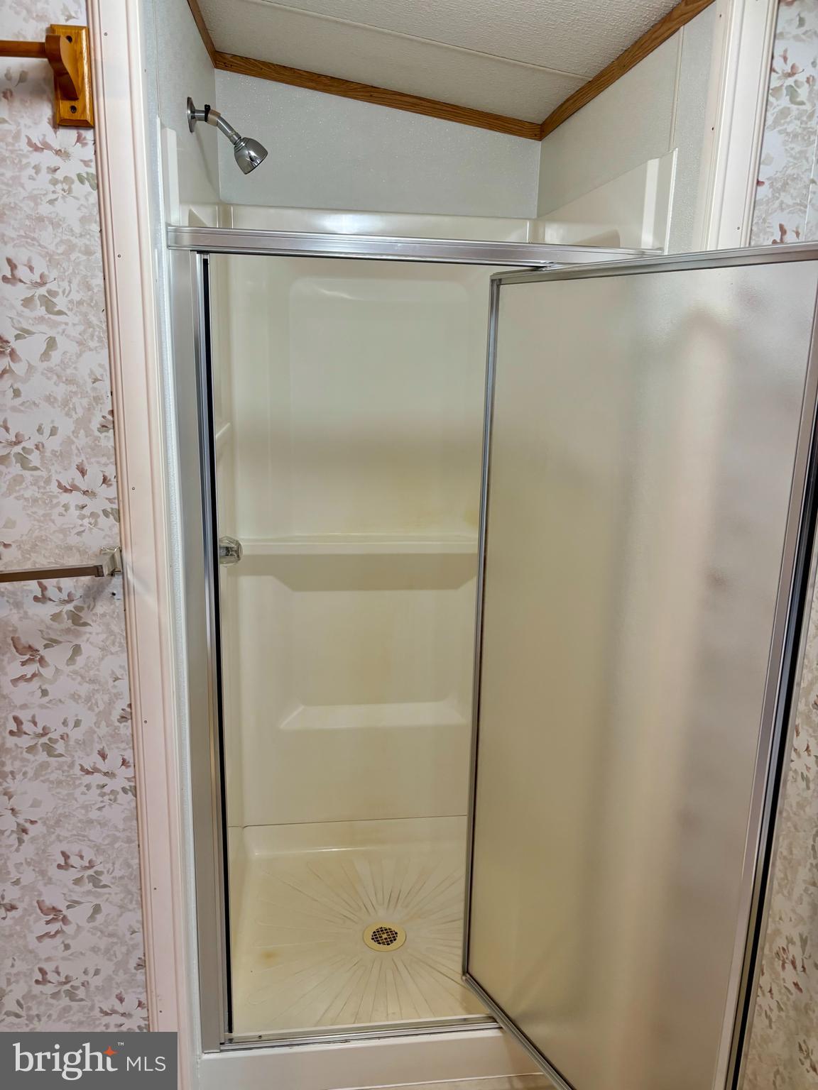 8568 Deer Road Slatington, PA 18080 - Photo 12 of 37 a bathroom with a glass shower door