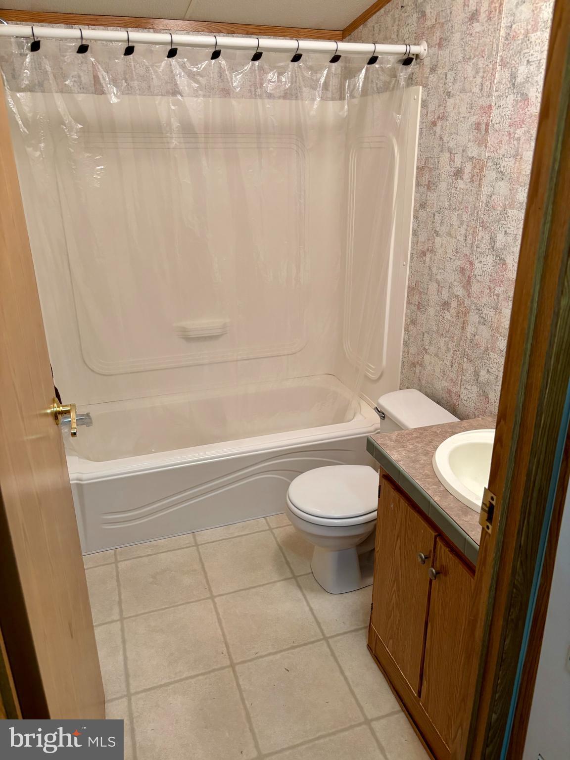 8568 Deer Road Slatington, PA 18080 - Photo 16 of 37 a bathroom with a sink a toilet and shower