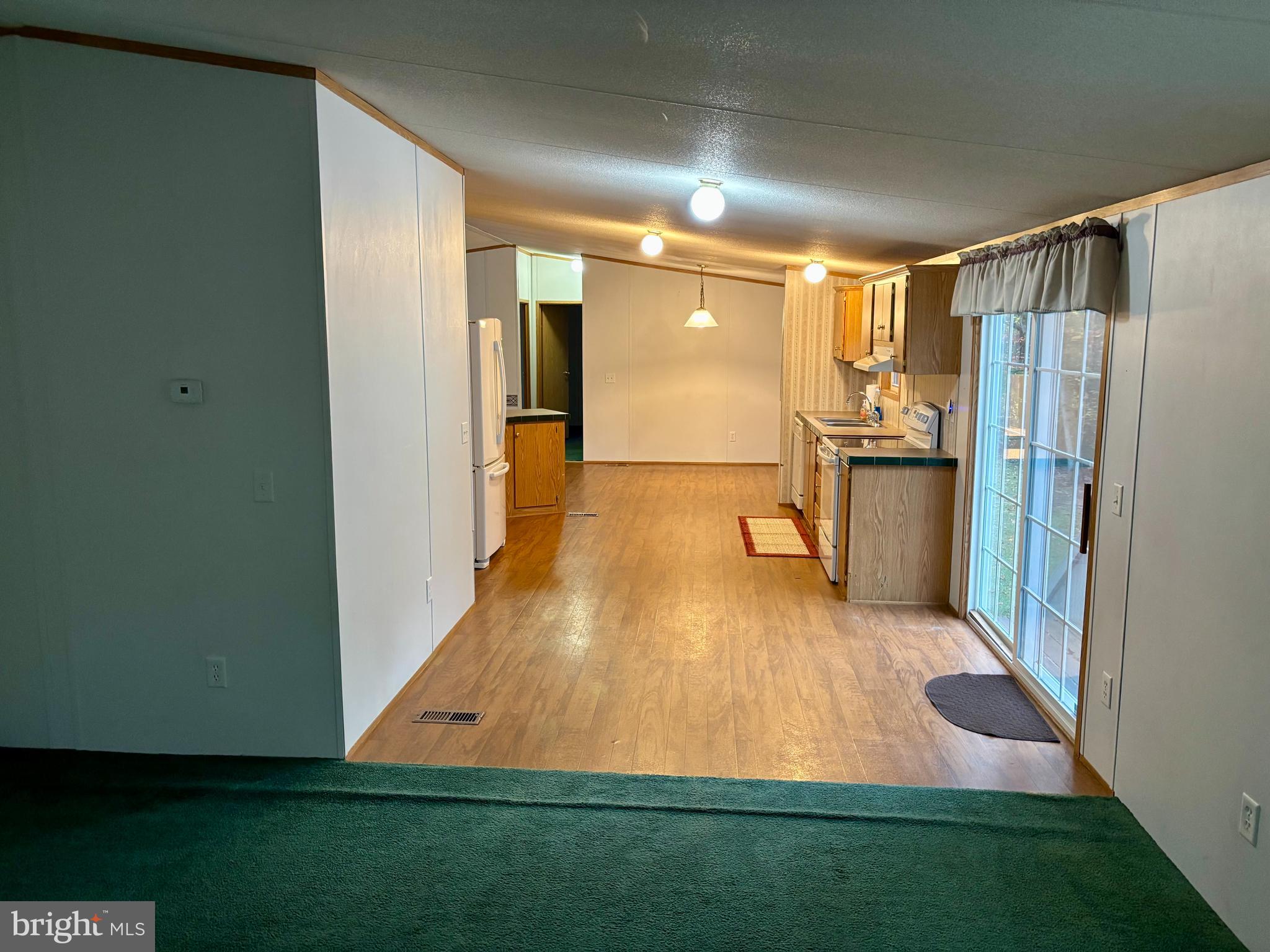 8568 Deer Road Slatington, PA 18080 - Photo 19 of 37 a view of entryway with wooden floor