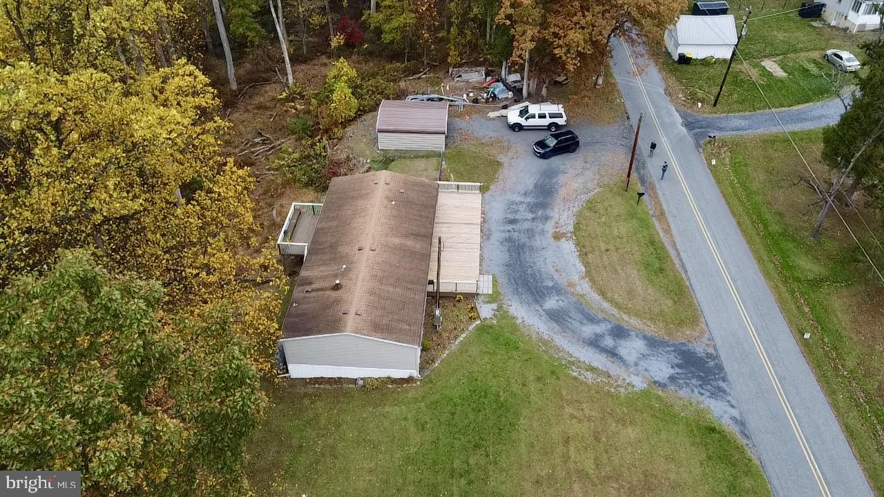 8568 Deer Road Slatington, PA 18080 - Photo 29 of 37 an aerial view of a house with swimming pool garden and tall trees