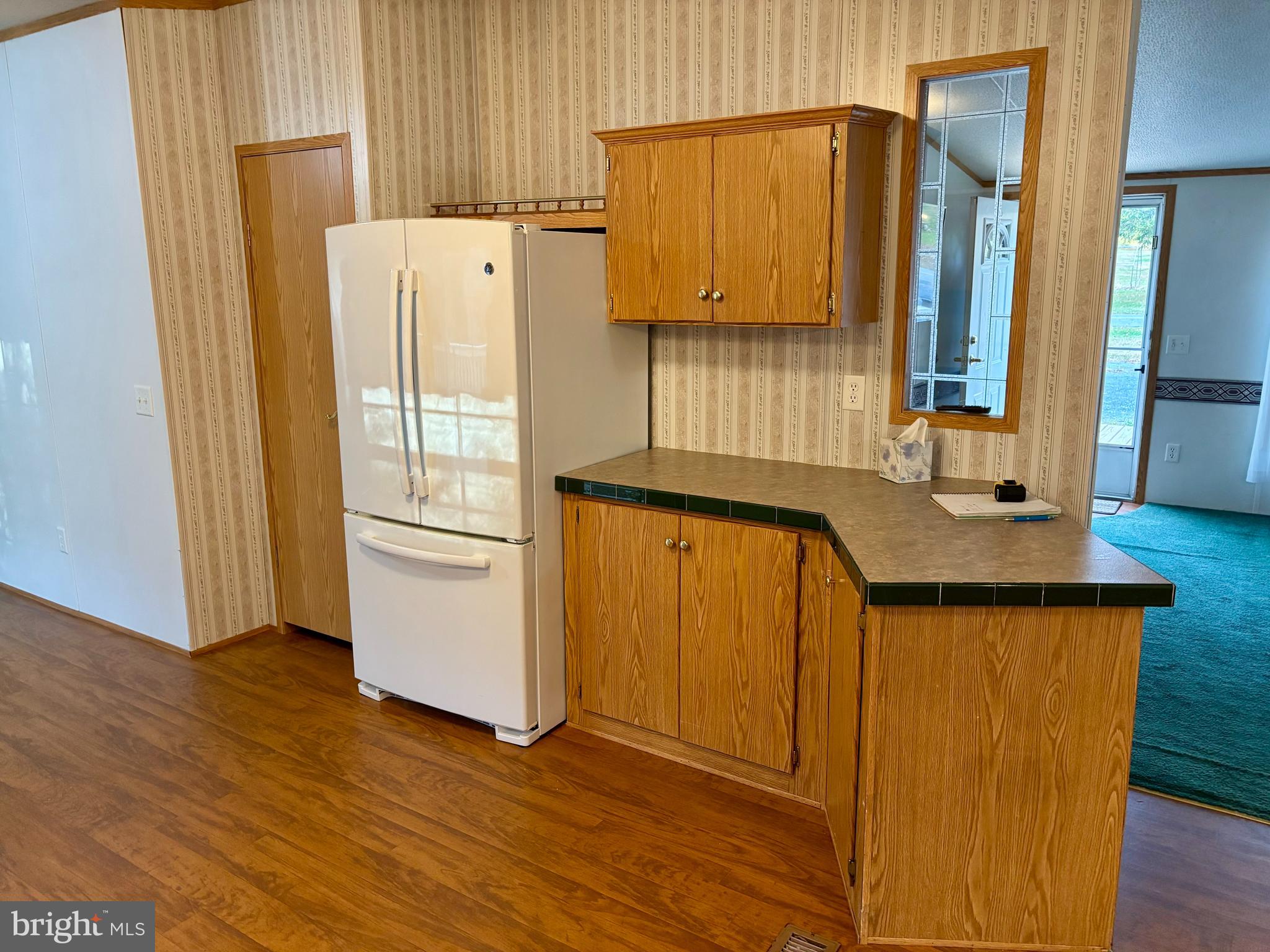 8568 Deer Road Slatington, PA 18080 - Photo 5 of 37 a kitchen with stainless steel appliances a refrigerator and a stove