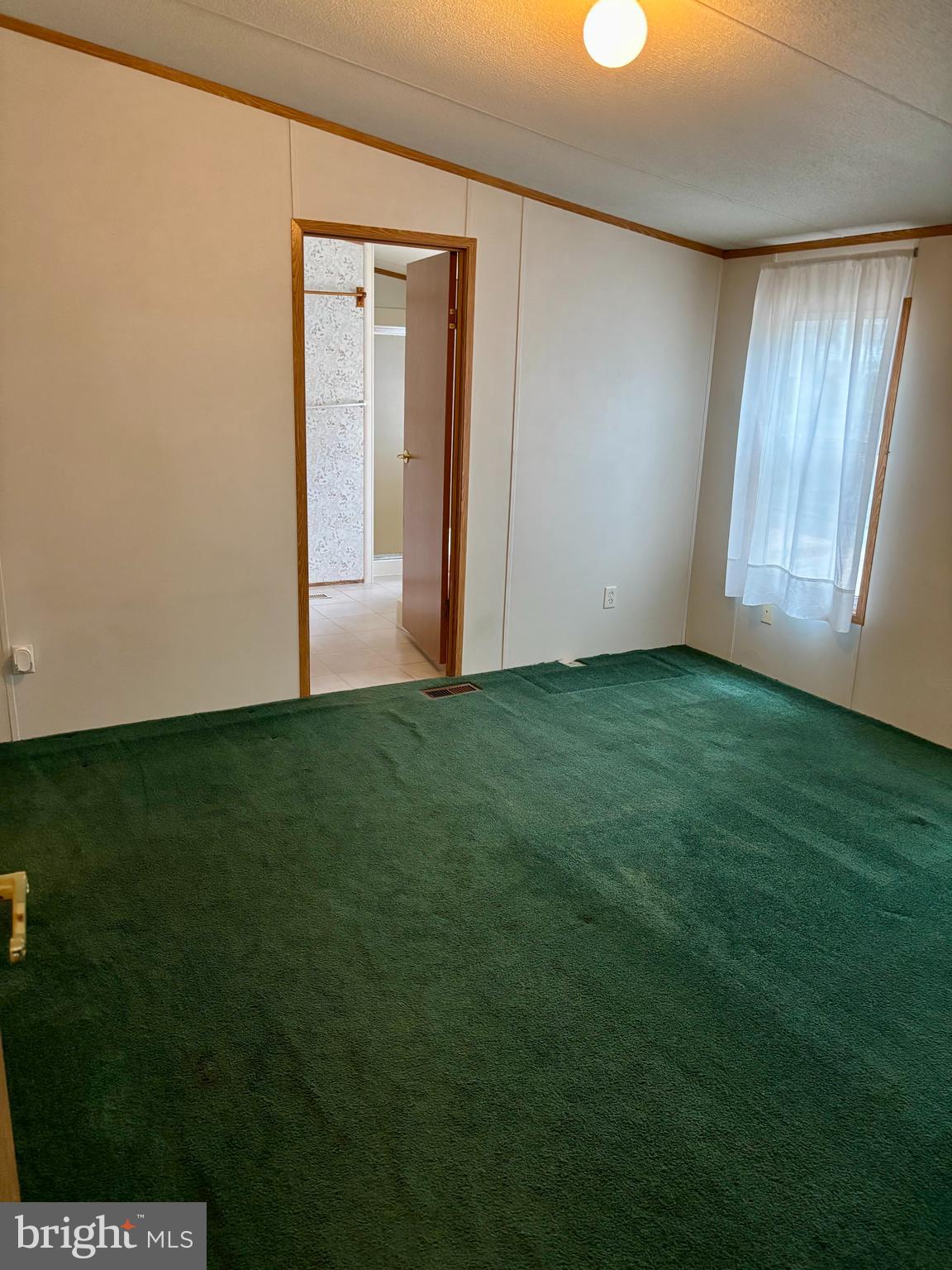 8568 Deer Road Slatington, PA 18080 - Photo 10 of 37 a view of an empty room with closet and a window