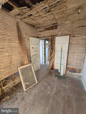 a view of a room with racks on the wall