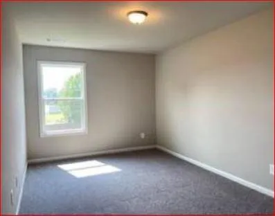 an empty room with a window