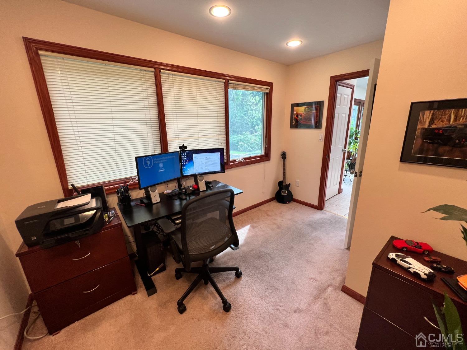 55 Winton Road East Brunswick, NJ 08816 - Photo 14 of 39 a living room with furniture and a flat screen tv