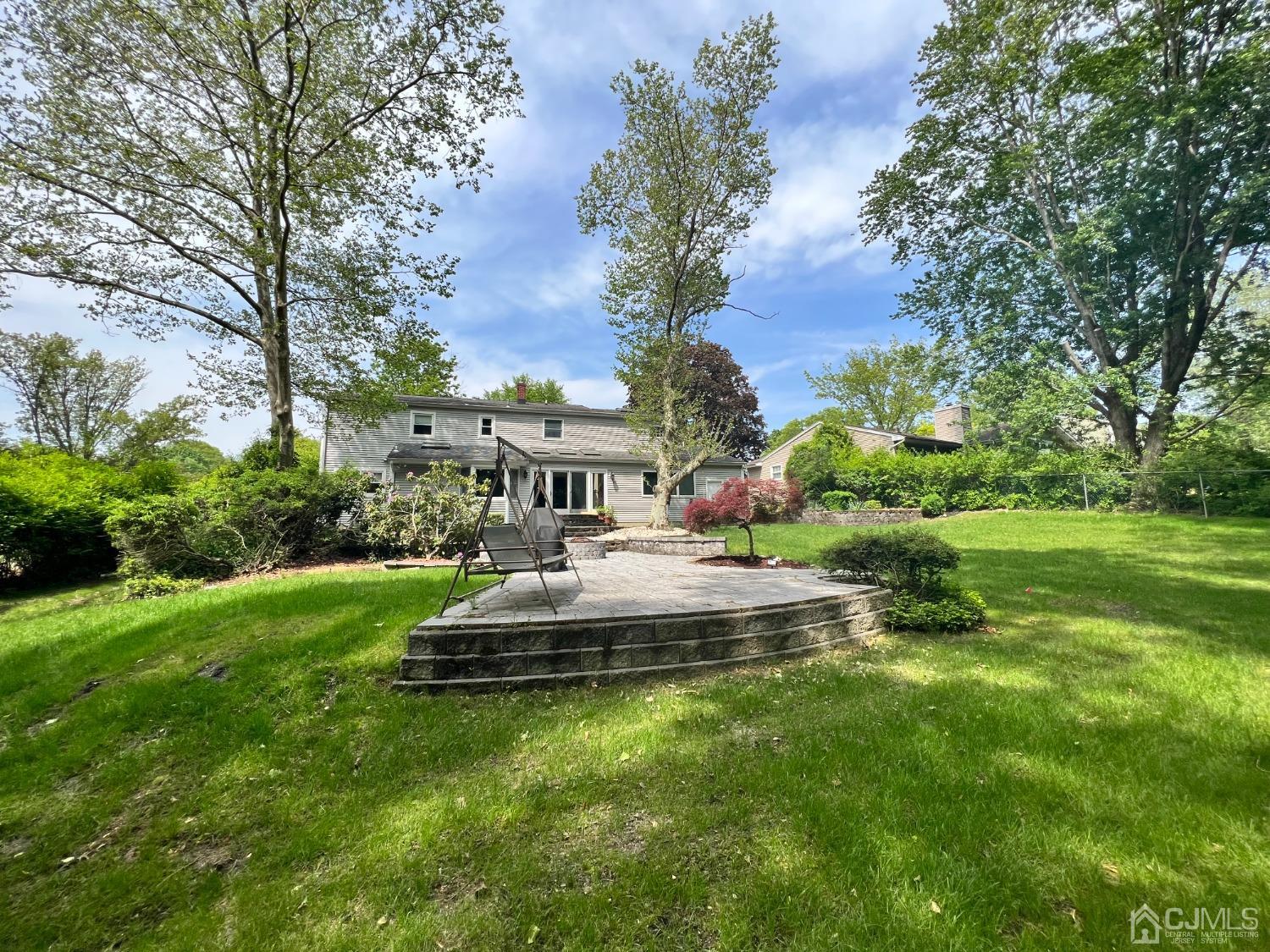 55 Winton Road East Brunswick, NJ 08816 - Photo 37 of 39 a view of a house with a yard and sitting area