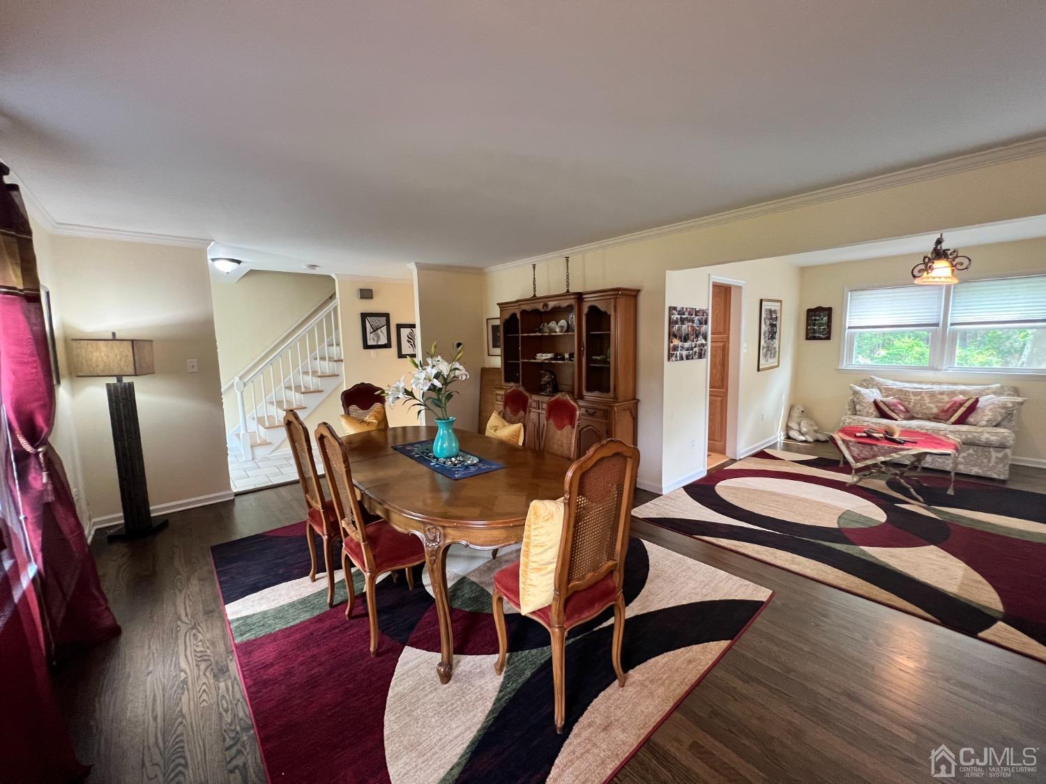 55 Winton Road East Brunswick, NJ 08816 - Photo 6 of 39 a view of a dining room with furniture and wooden floor