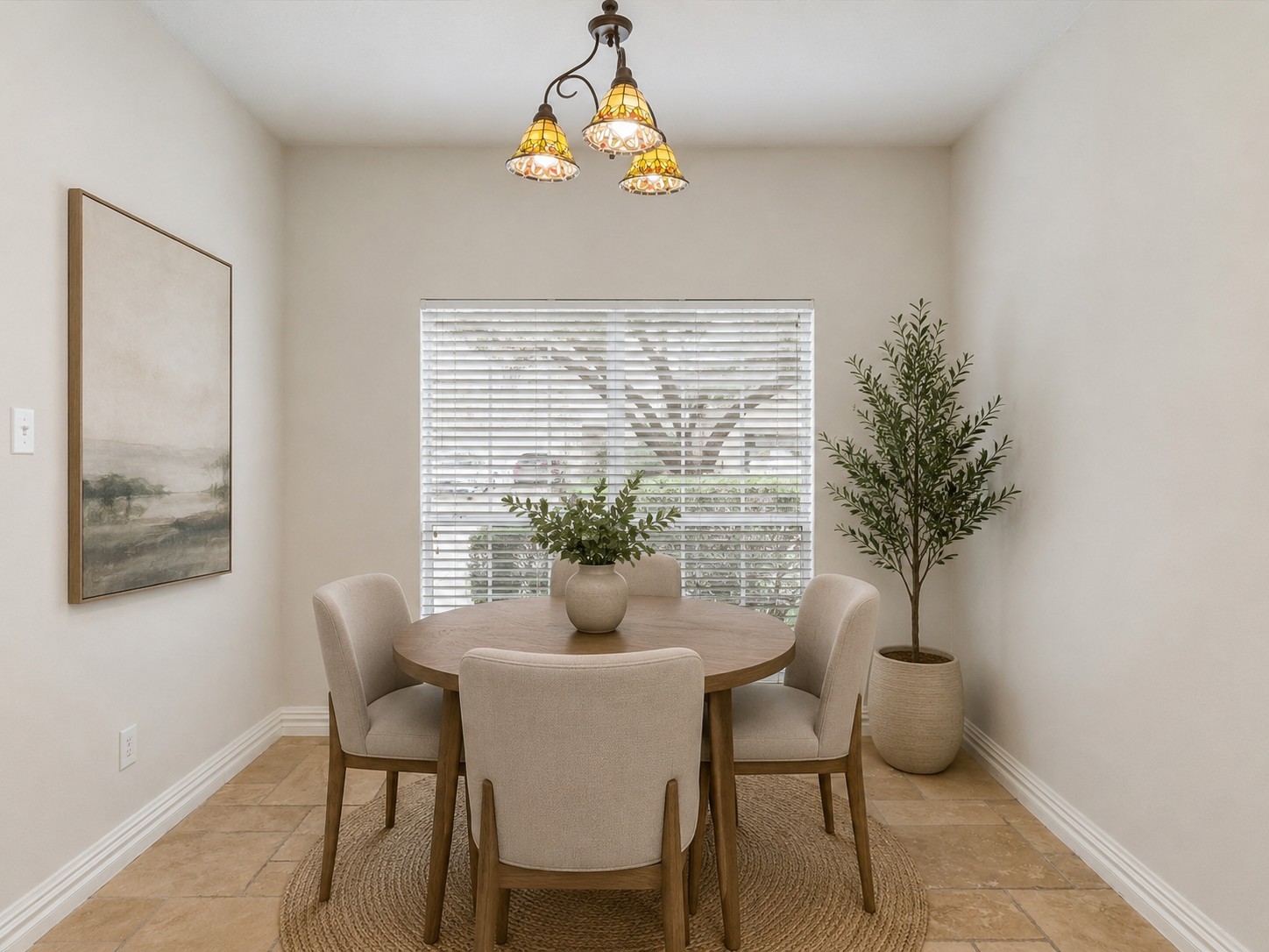 19422 Harvest Stream Way Houston, TX 77084 - Photo 13 of 41 Experience the charm of a bright breakfast room with a large window that floods the space with natural light, beautifully AI-staged to spark your imagination.