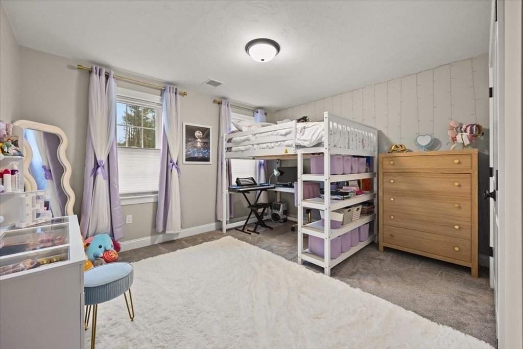 70 Sandy Hill Road Raynham, MA 02767 - Photo 26 of 42 a view of a bedroom with furniture and closet