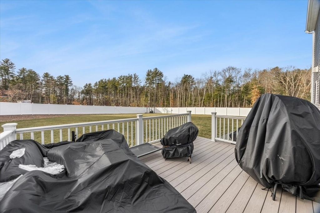 70 Sandy Hill Road Raynham, MA 02767 - Photo 36 of 42 a view of sitting area with furniture and wooden floor