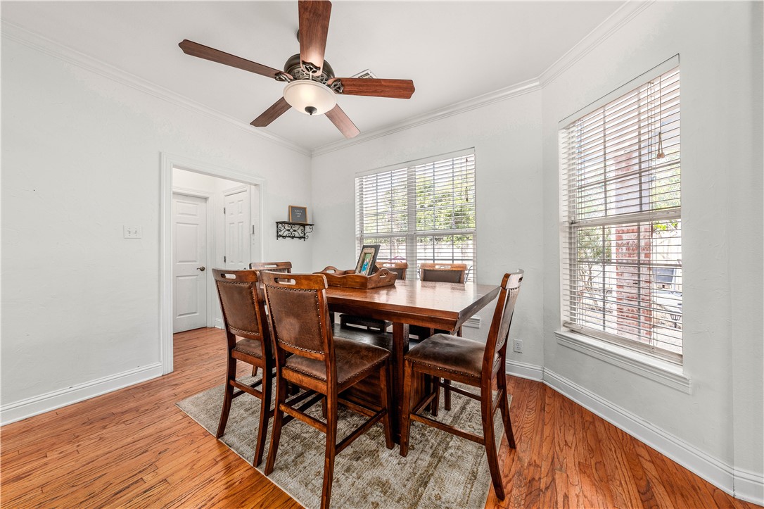 3313 Fox Hollow Circle Waco, TX 76708 - Photo 31 of 88 a view of a dining room with furniture window and wooden floor