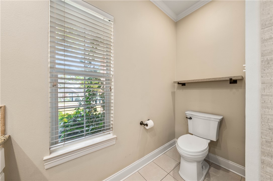 3313 Fox Hollow Circle Waco, TX 76708 - Photo 42 of 88 a white toilet sitting next to a window