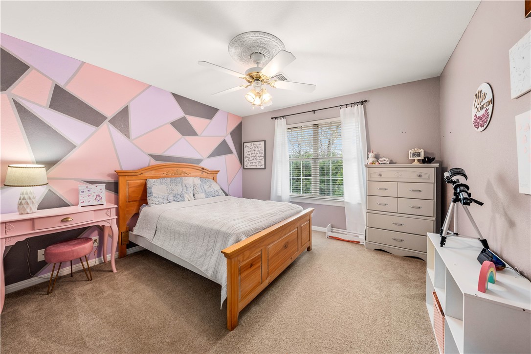 3313 Fox Hollow Circle Waco, TX 76708 - Photo 60 of 88 a bedroom with a bed and a cabinets