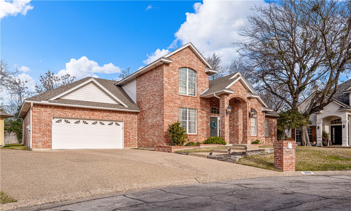 3313 Fox Hollow Circle Waco, TX 76708 - Photo 86 of 88 a view of a house with a yard and garage