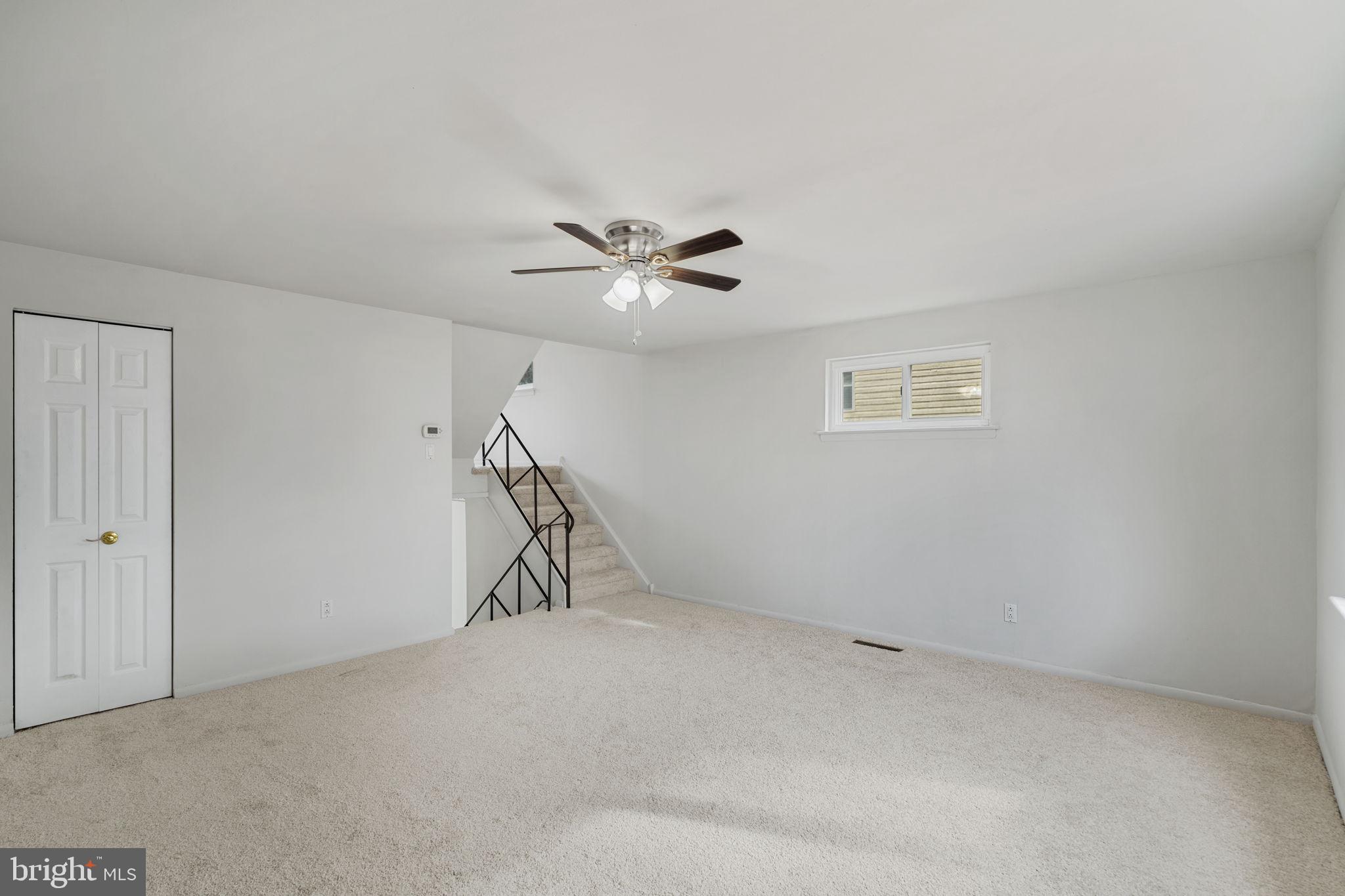 859 Andover Road Lansdale, PA 19446 - Photo 11 of 44 a view of an empty room with a ceiling fan