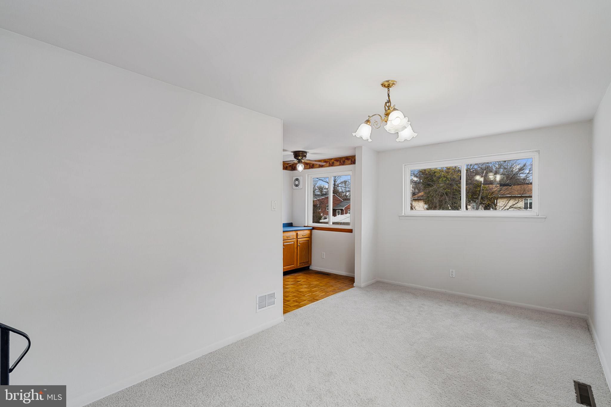 859 Andover Road Lansdale, PA 19446 - Photo 14 of 44 wooden floor in an empty room with a window