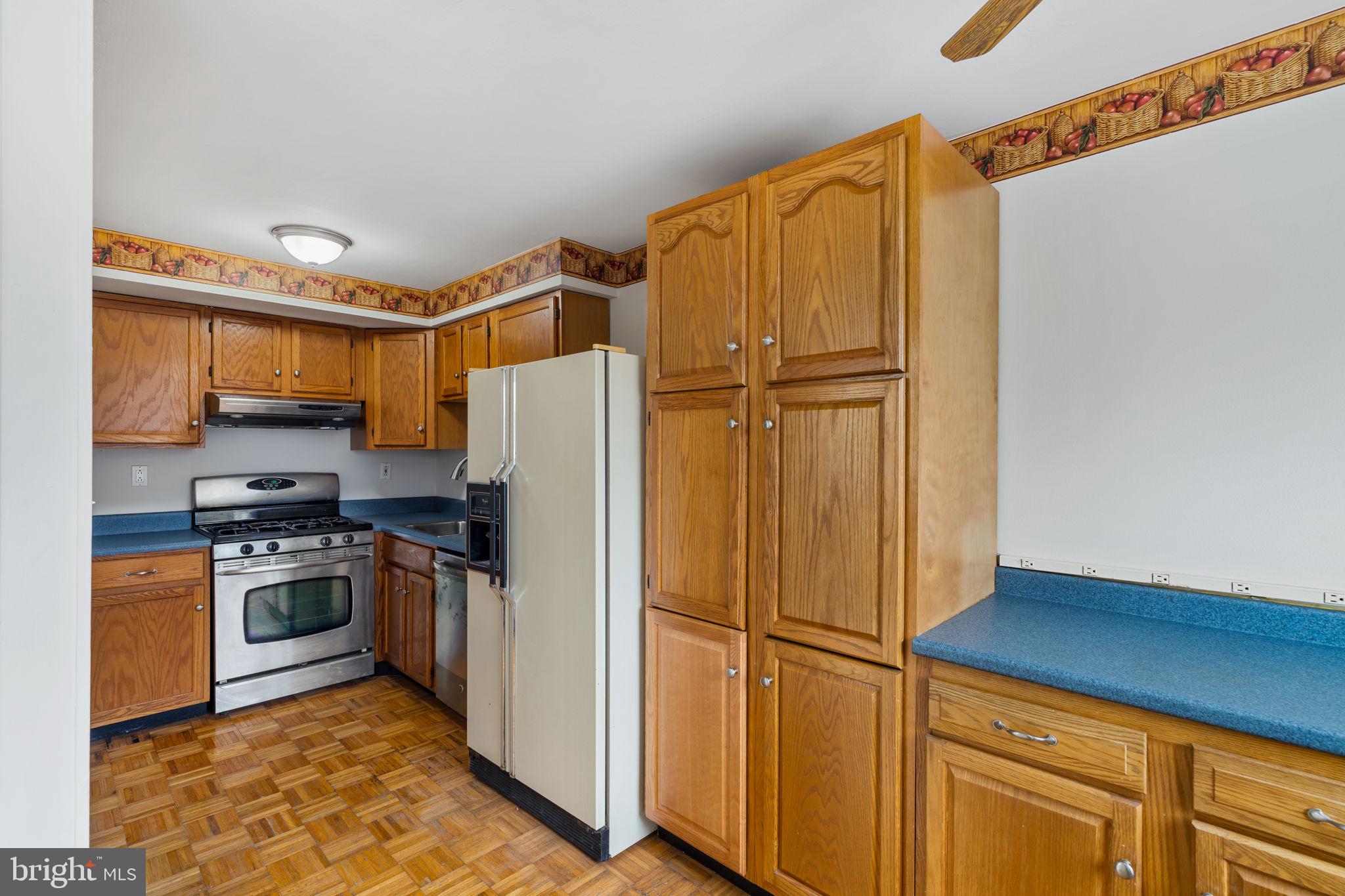 859 Andover Road Lansdale, PA 19446 - Photo 17 of 44 a kitchen with stainless steel appliances granite countertop a refrigerator a stove and a sink