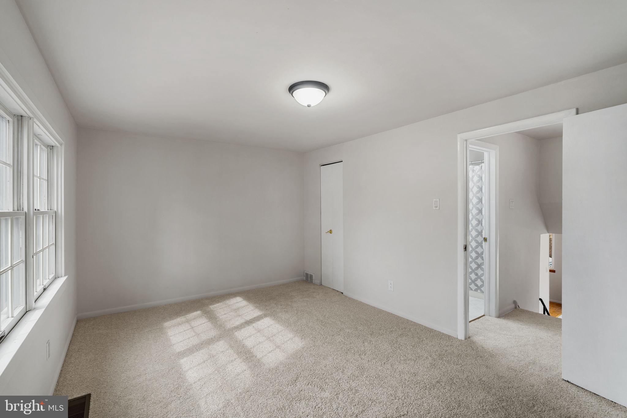 859 Andover Road Lansdale, PA 19446 - Photo 25 of 44 an empty room with windows