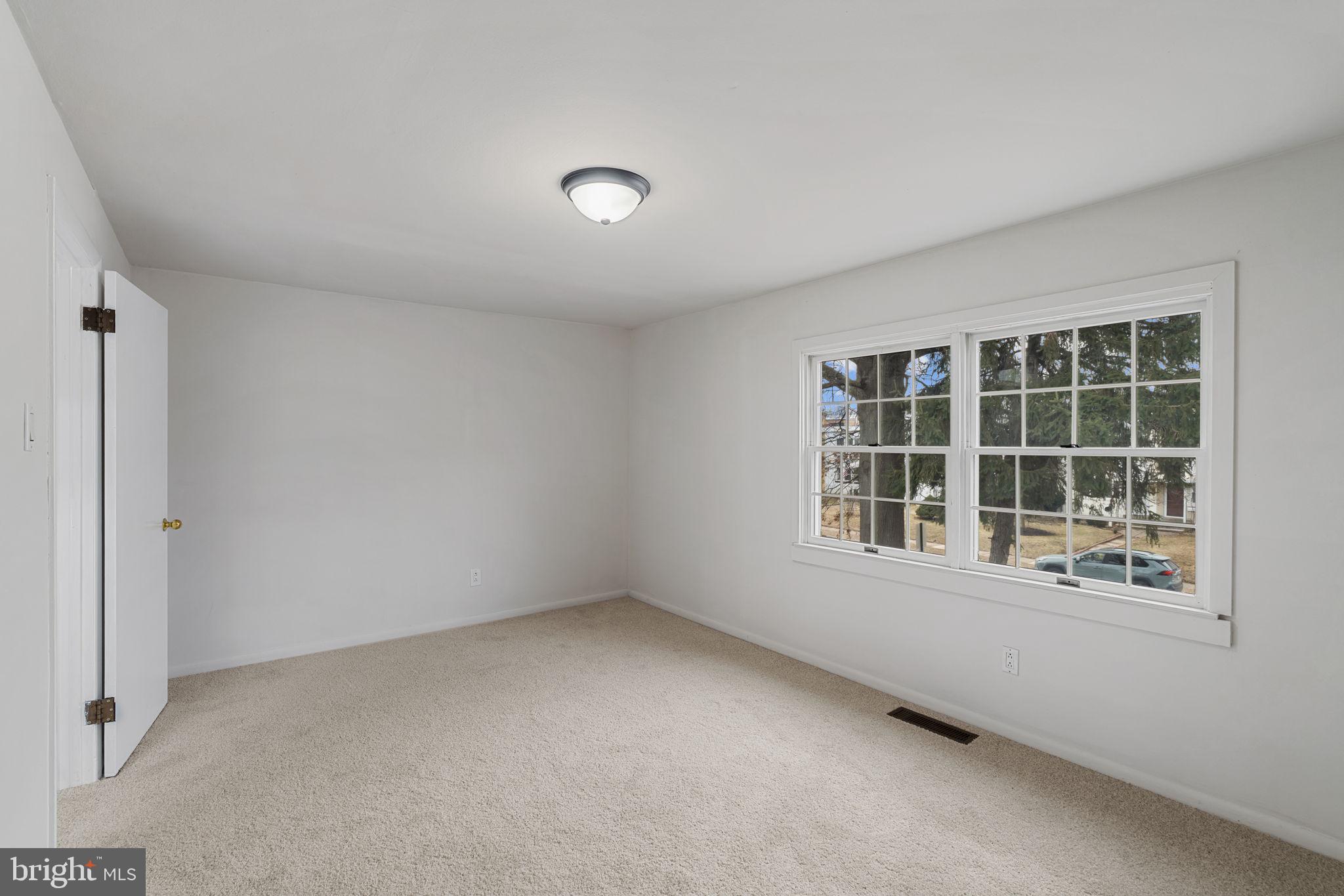 859 Andover Road Lansdale, PA 19446 - Photo 26 of 44 an empty room with a window