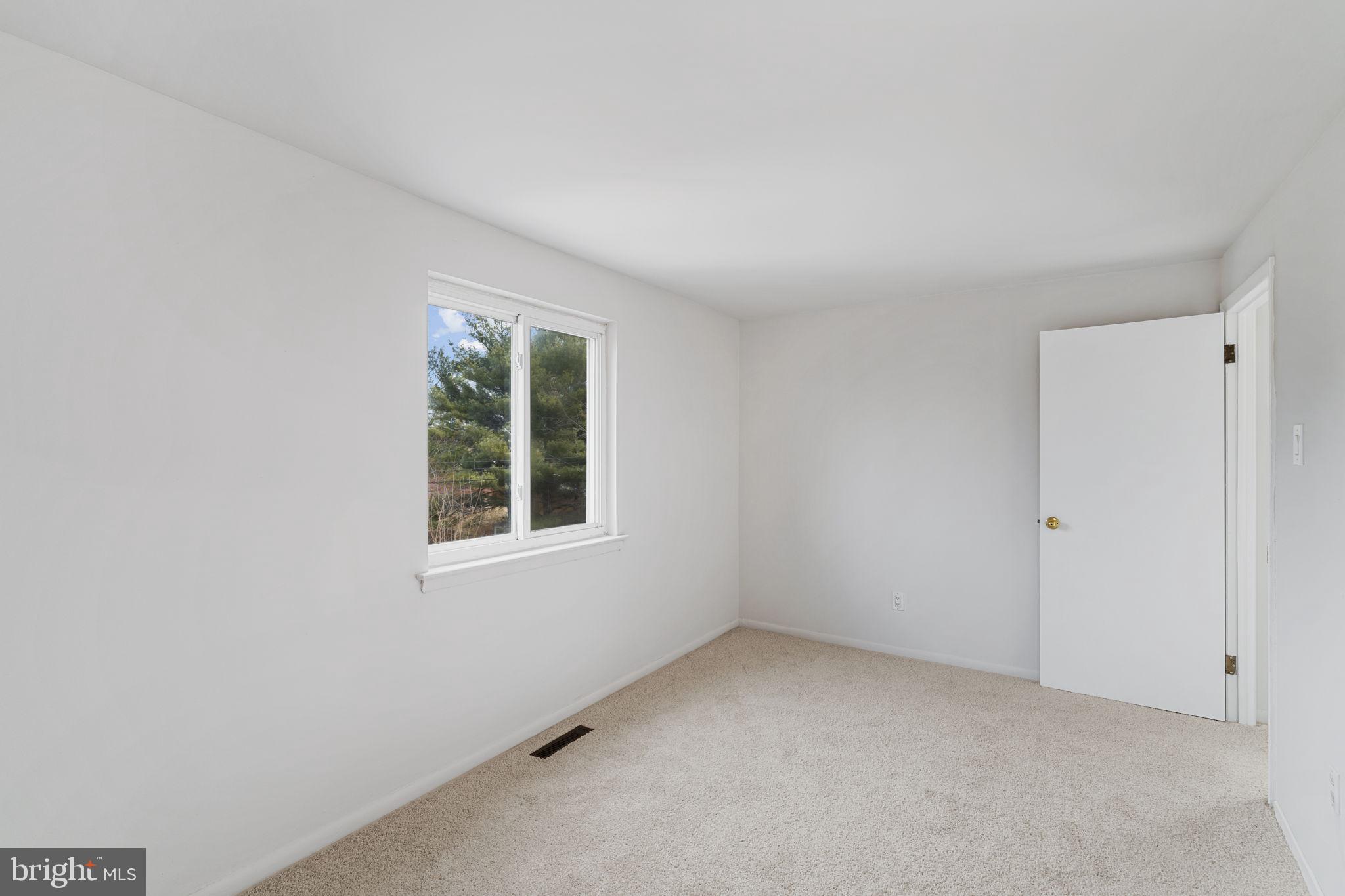 859 Andover Road Lansdale, PA 19446 - Photo 32 of 44 an empty room with a window